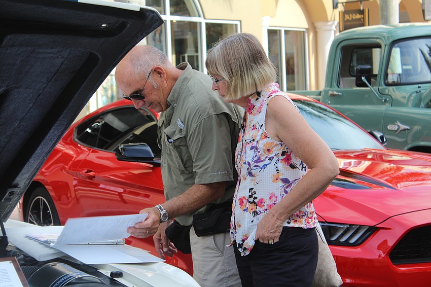 Lakewood Ranch's Don and Dona Lippert read about a show car on Main Street.
