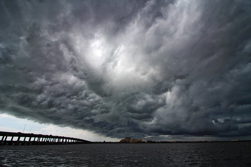 August winner: Richard Bottorff captured storm clouds rolling in recently as he walked on the Bradenton Riverwalk.