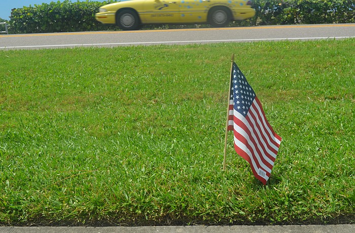 Each flag along Gulf of Mexico Drive honors one of the victims of the Sept. 11 terrorist attacks.