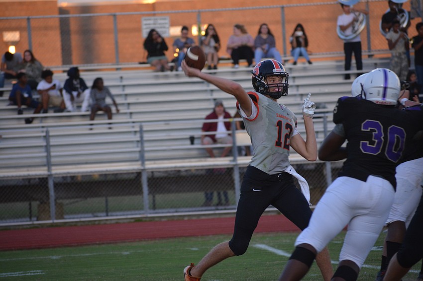 Sarasota's Vincent Parisi launches a downfield pass.