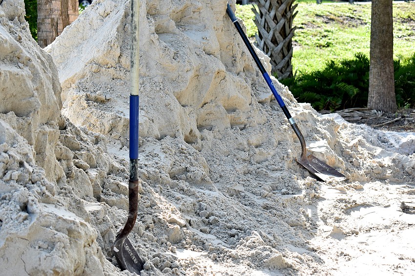 The public works department is on site to make sure only Longboat residents get sand.