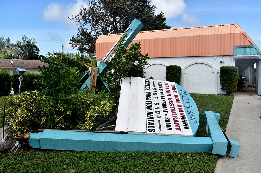 The sign for the Plaza at 6510 Gulf of Mexico drive was knocked down.  Photo by Katie Johns
