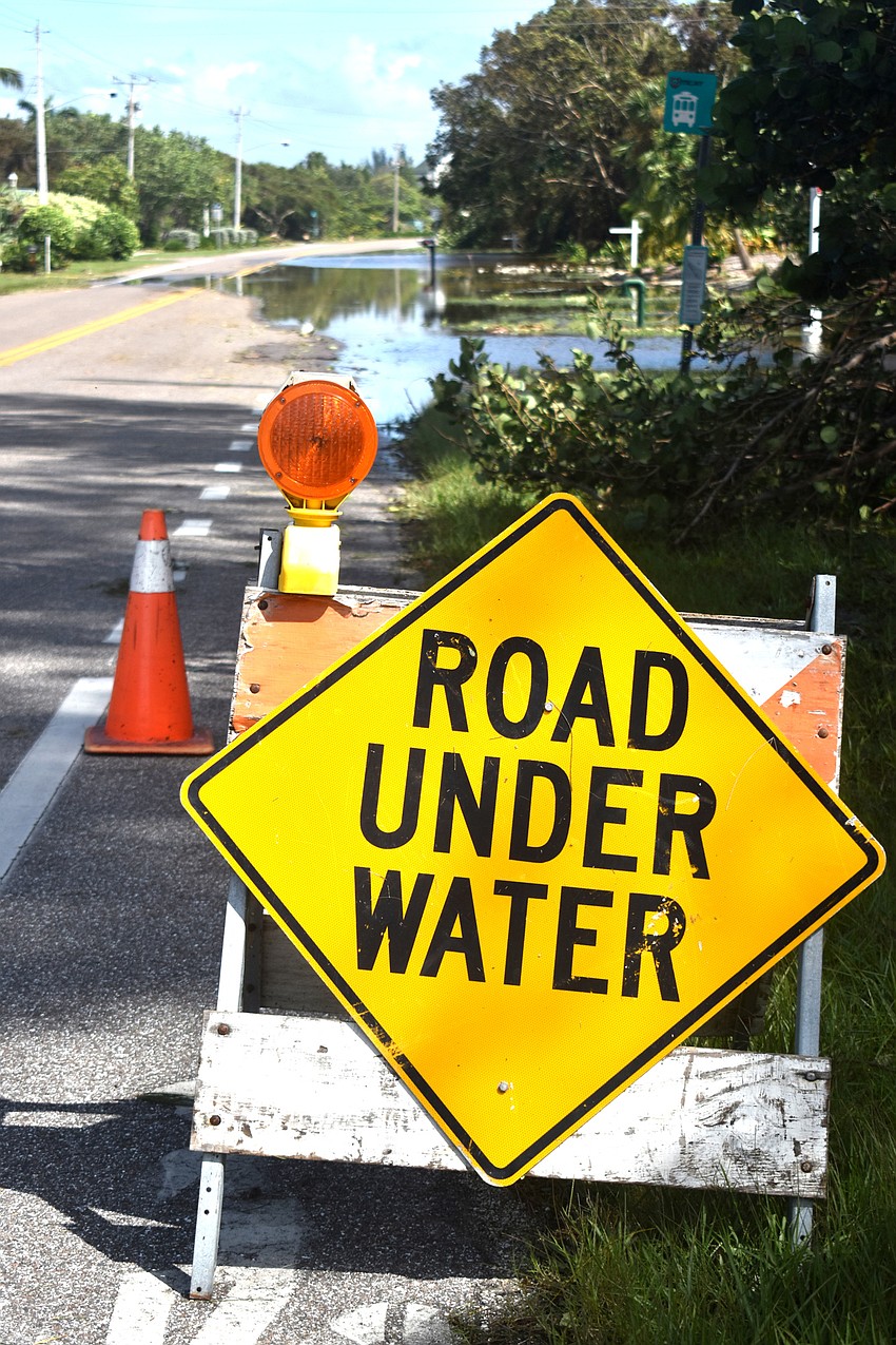 Minor flooding on Gulfside Road was spreading onto Gulf of Mexico Drive on Sept. 11.  Photo by Katie Johns
