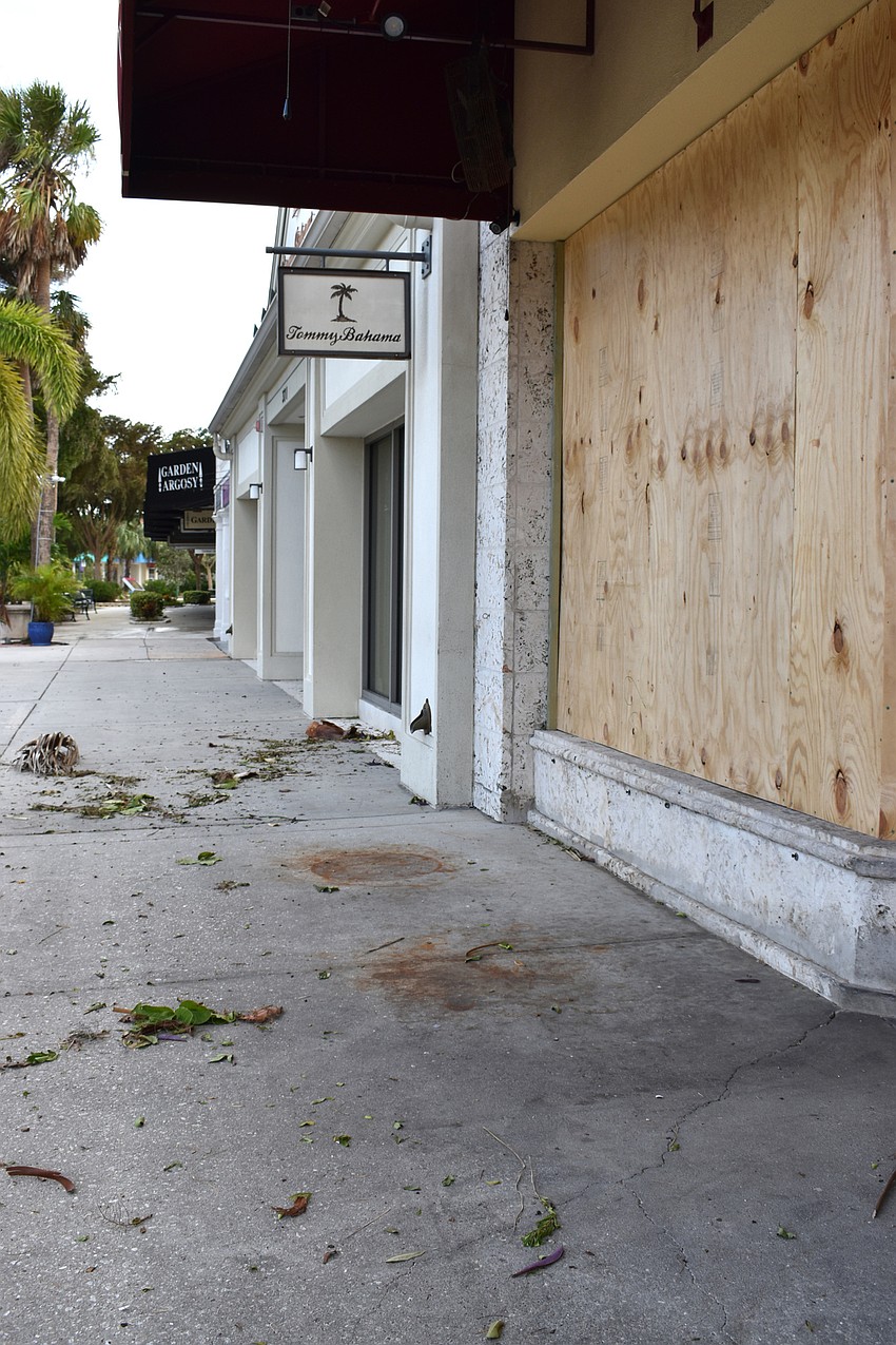St. Armands Circle was covered in fallen tree debris after Hurricane Irma. Photo by Niki Kottmann