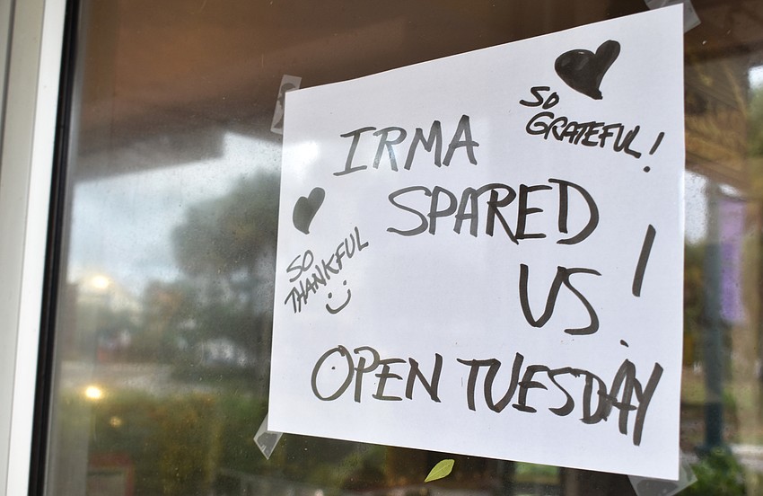 The sign outside Dream Weaver Collection boasted about how lucky residents were to have been “spared” by Hurricane Irma. Photo by Niki Kottmann