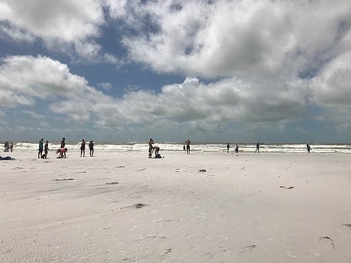 No lifeguards were on duty, but Siesta Beach was littered with people checking out the Gulf after the storm.