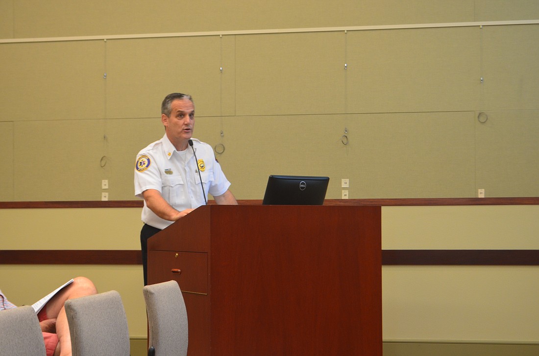 Longboat Key Fire and Rescue Chief Paul Dezzi speaks at an emergency meeting of the town commission ahead of the storm.