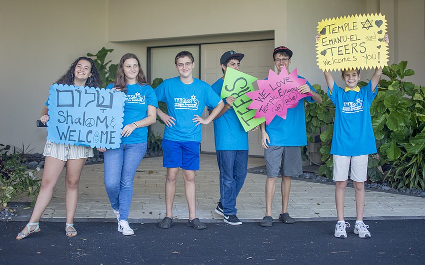 Temple Emanu-El Religious School members greeted congregants on Sunday.
