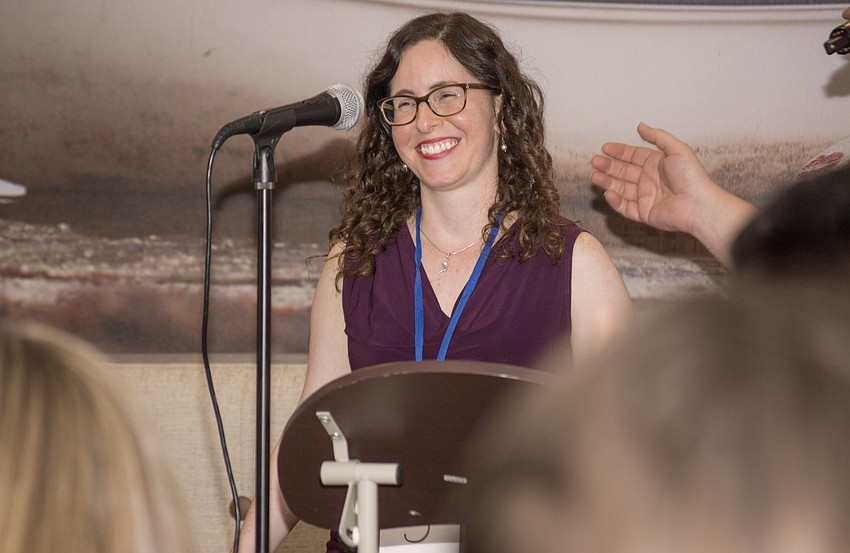 Rachel Scheer smiles after winning the YPG Spelling Bee.