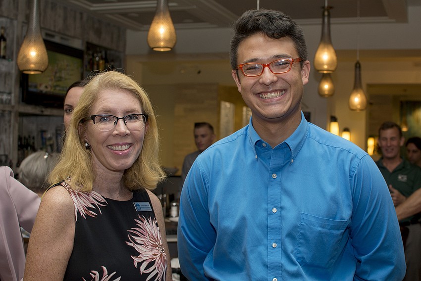 Janice Loppe and Young Professionals Group Chairman-elect Rob Young.