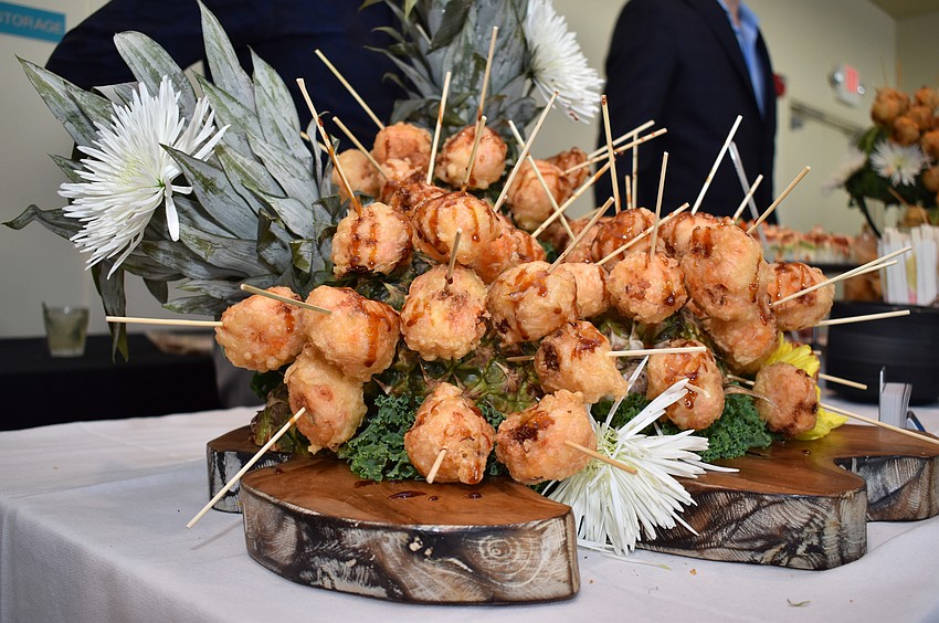 Tsunami Sushi & Hibachi Grill served lobster and crab cake pops at the Eat Like a Local Restaurant Week Kickoff Event on Sept. 20 at Keating Marine Education Center.