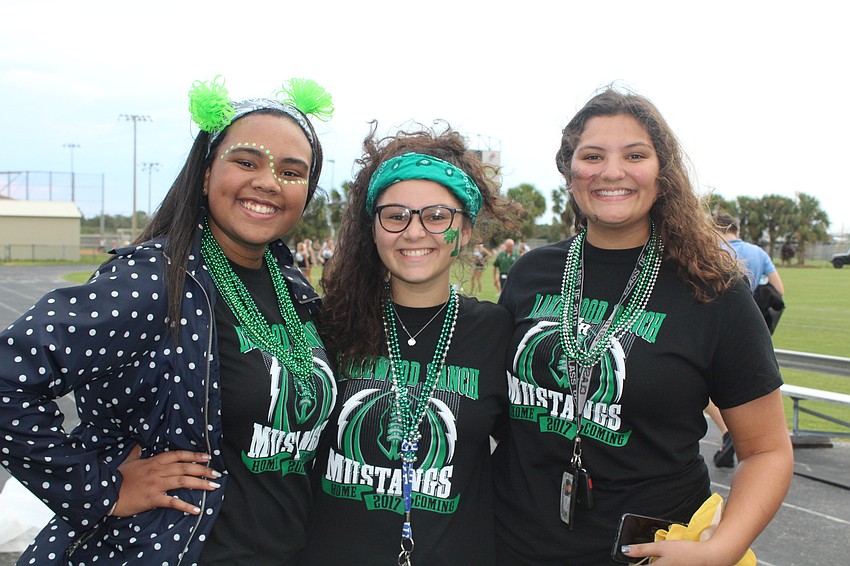 Lakewood Ranch High School senior Frances Casaine, junior Julianna Catena and senior Kailey Carpenter show some school spirit.