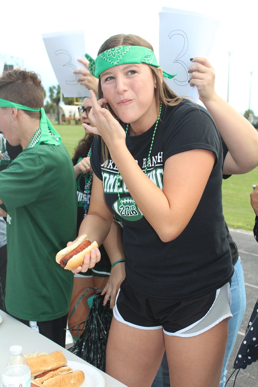 Lakewood Ranch High School junior Morgan Gaston competes in the hot dog eating contest.