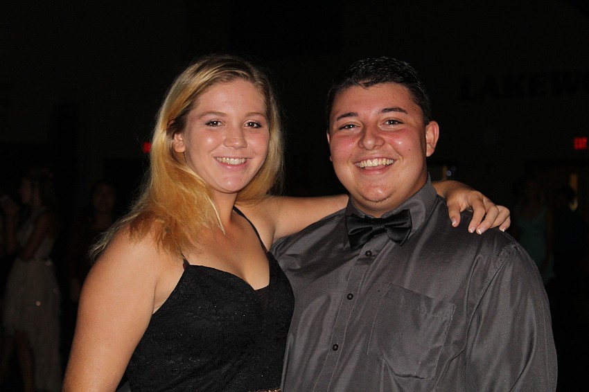 Lakewood Ranch High School seniors Jade Ebnonds and Taylor Butler hang out on the dance floor during homecoming dance.