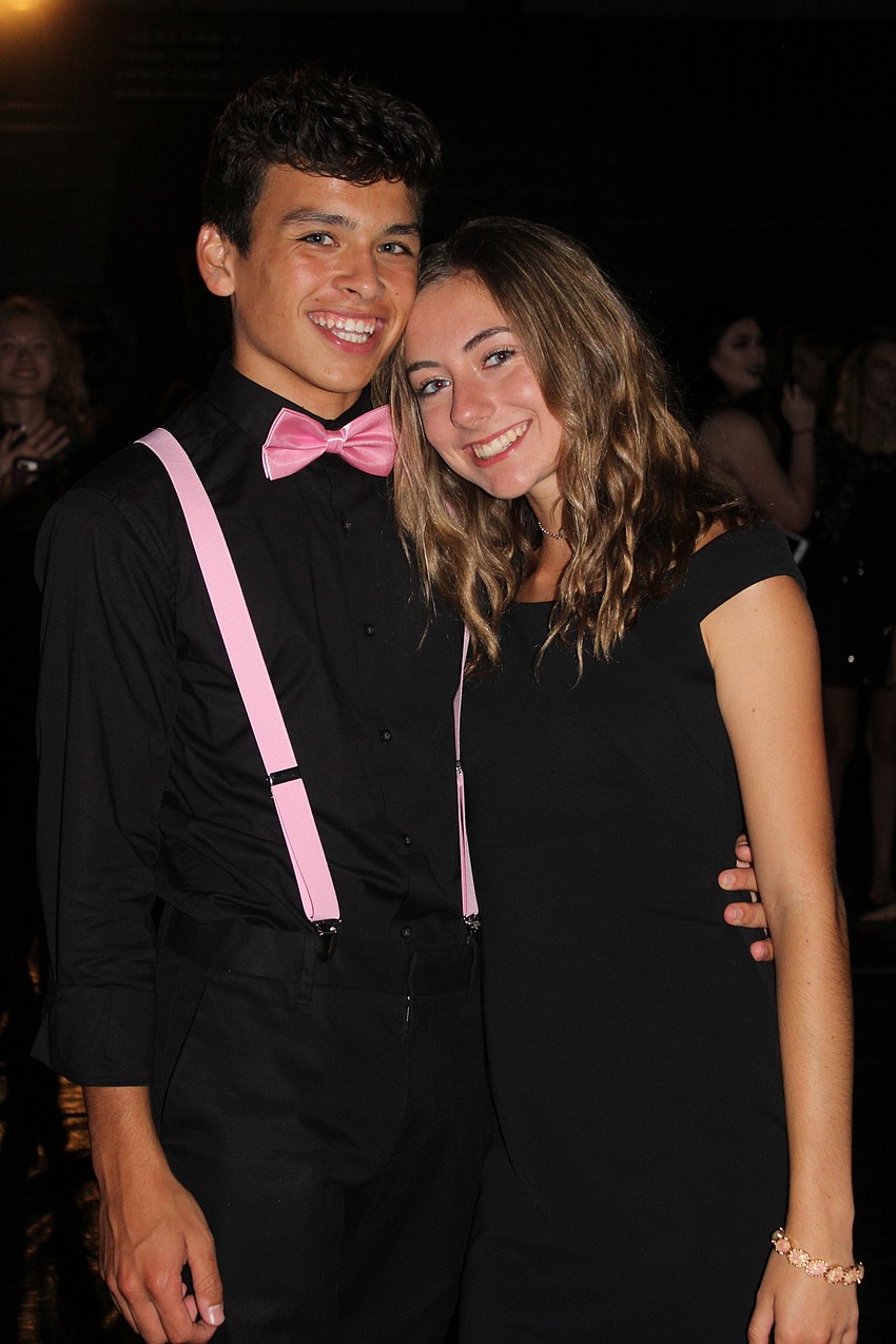 Lakewood Ranch High School sophomores Anthony Sablan and Bailey Wagenast snuggle up on the dance floor.