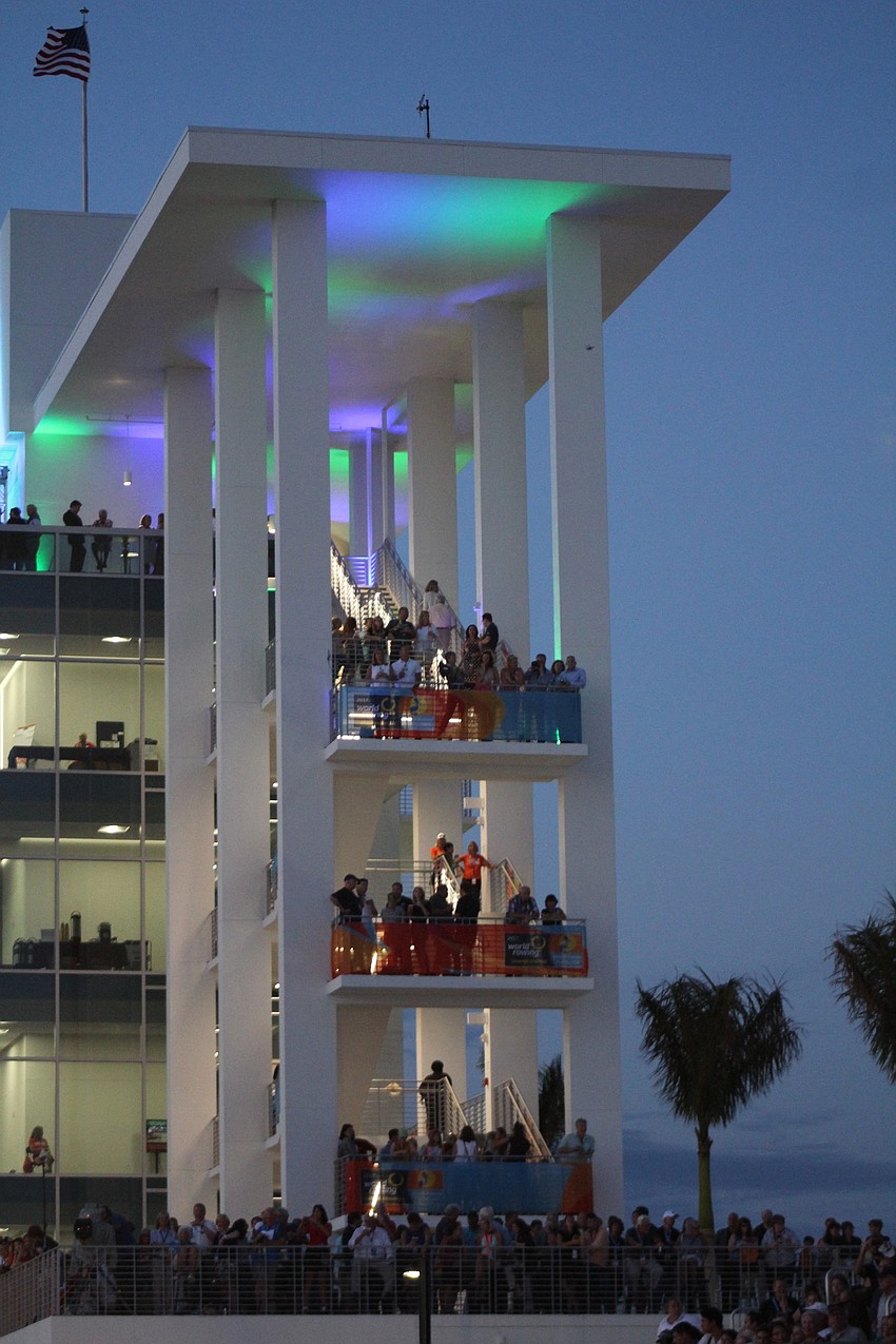 The VIP guests hang out in the tower at Nathan Benderson Park for the opening ceremony.