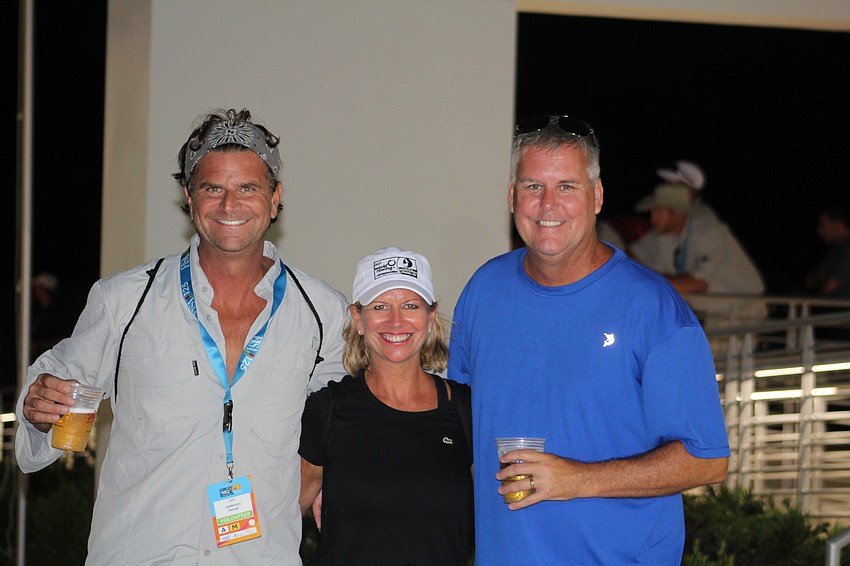 Lakewood Ranch's Sammy Cerritio, Melinda Slicis and Tim Slicis enjoy a beverage at the finish  tower at Nathan Benderson Park.