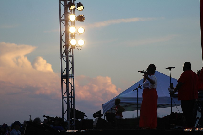 Jah Movement  performs island-style music for the crowd during the opening ceremony for the World Rowing Championship.