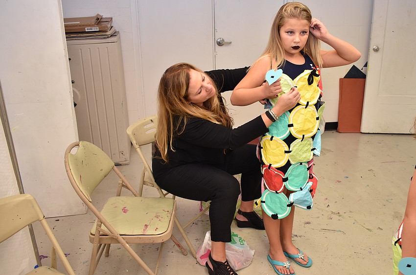 Cambelle Anders gets ready for the iconcept jr. fashion show on Sept. 24 at Art Center Sarasota.