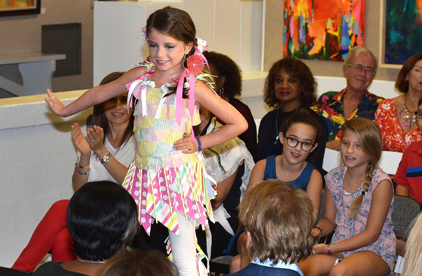 Madison Anderson strikes a pose on the runway during the iconcept jr. fashion show on Sept. 24 at Art Center Sarasota.