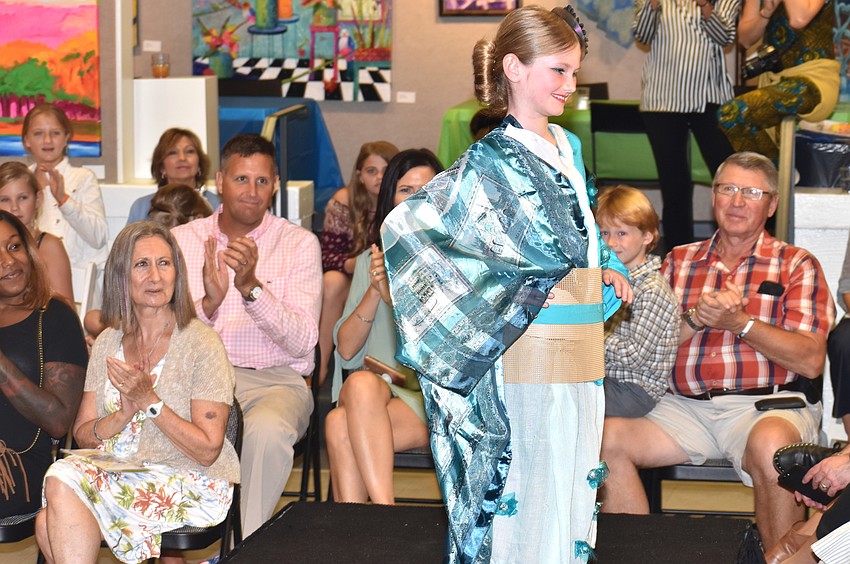 Eden Hurley poses for the cameras during the iconcept jr. fashion show on Sept. 24 at Art Center Sarasota.