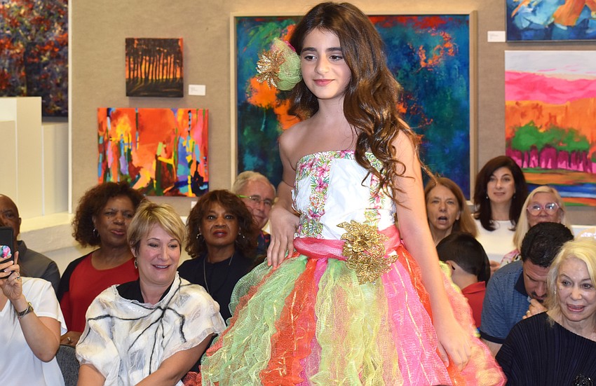 Tara Torehan walks the runway during the iconcept jr. fashion show on Sept. 24 at Art Center Sarasota.
