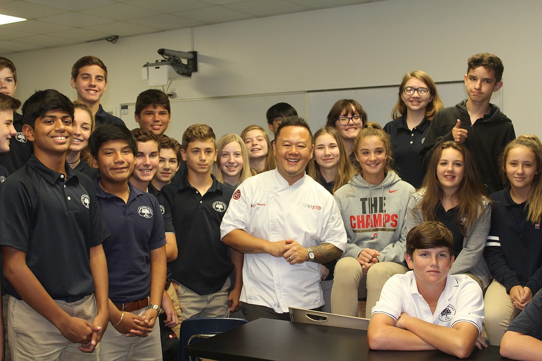 Chef Jet Tila with Dr. Joann Barrett and Stephanie Sassettiâ€™s eighth-grade science class following a cooking lesson.