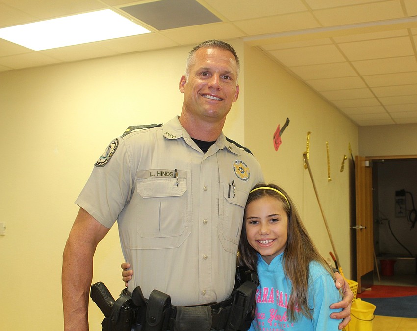 Louis Hinds and Braden River Elementary School third-grader Lilly Hinds spend some father-daughter time together before school.
