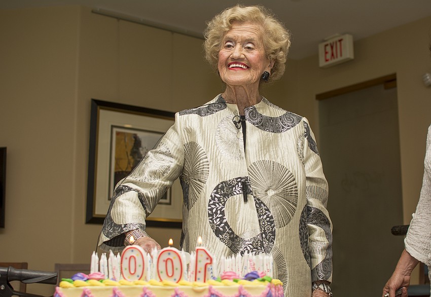 Betty Schoenbaum poses with her birthday cake.