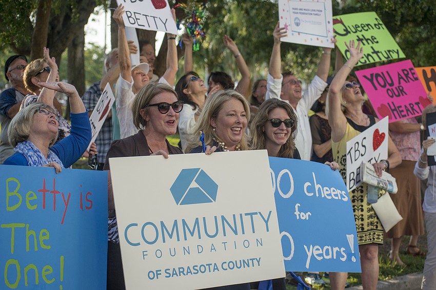 Patricia Martin, Shaun Rogers, Marlo Turner and Madeline Hansen of the Community Foundation of Sarasota County wish Betty Schoenbaum a happy 1ooth birthday.