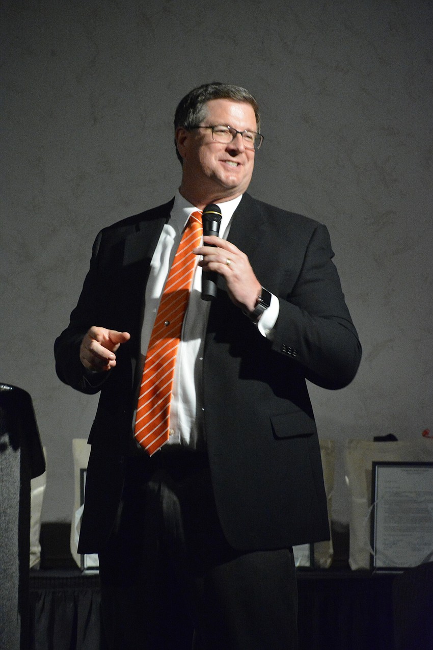 Sarasota High principal David Jones welcomes the crowd and gives opening remarks.