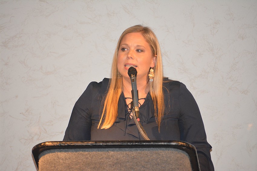 Jeana Schmidt introduces Tim Johnson.