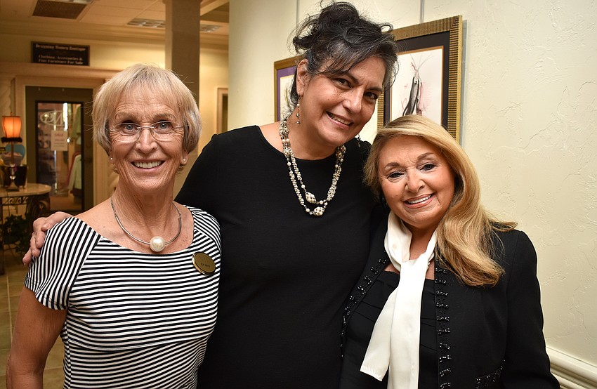 Sue Lamy, Boutique Manager Marisa Fowler and Board President Ida Zito