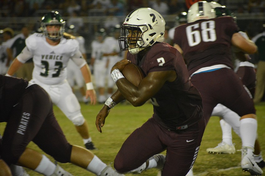 Senior running back Deshaun Fenwick cuts through the Venice defense.
