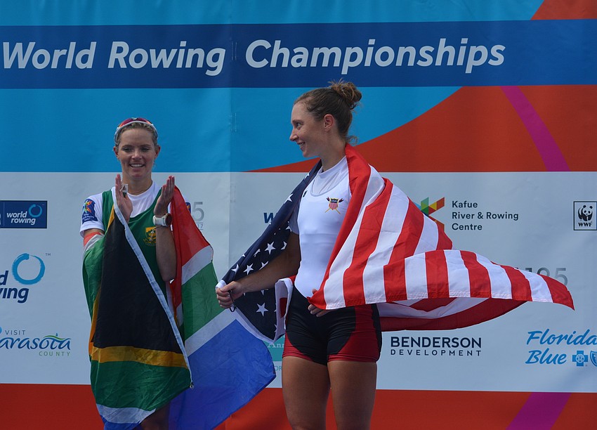 South Africa's Kirsten McCann, the gold medalist, watches American Mary Jones step forward to accept the bronze in the Lightweight Women's Single Sculls on Friday.