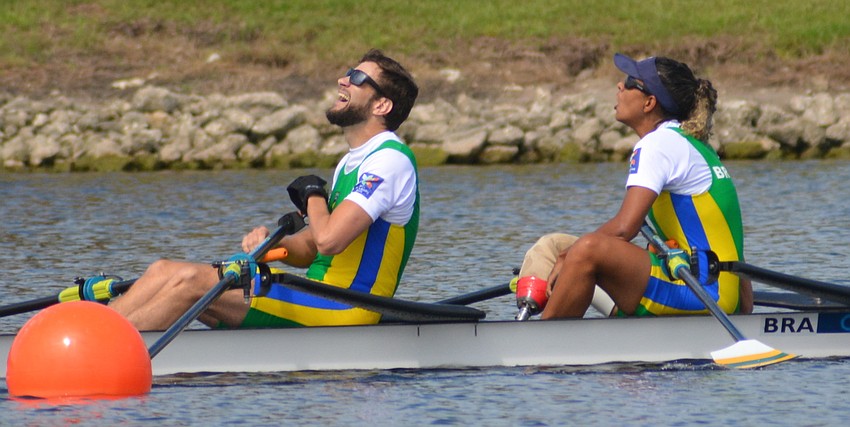 Brazil's Jairo Klug and Diana Barcelos de Oliveira react after winning the gold in the Para Rowing Mixed Double Sculls.