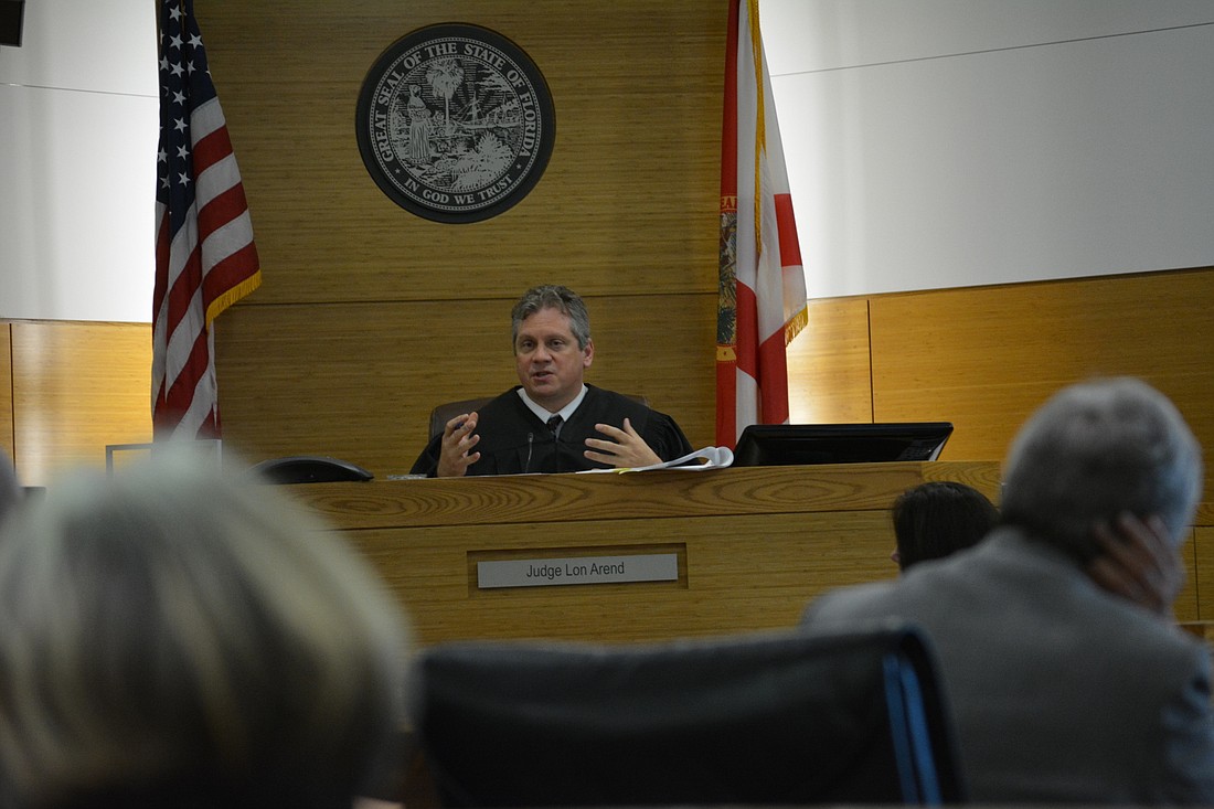 Judge Lon Arend addresses Tara residents who wish to comment on the settlement during a hearing Sept. 28.