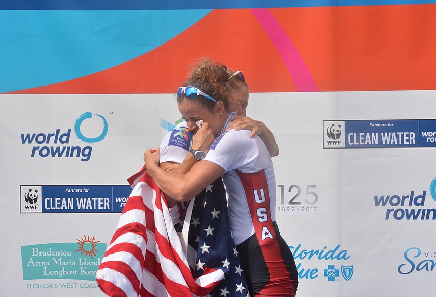 Emily Schmieg and Michelle Sechser embrace before receiving their Lightweight Women's Double Sculls bronze medals.