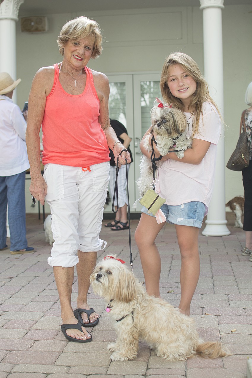 Sharon Farmer and Elle Broadway with dogs Molly and Tia.