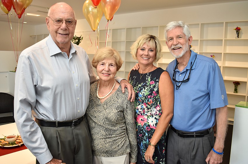 Arnold Simonsen and Ronda Montminy with Managing Director Rebecca Hopkins and Board of Trustees President Dennis McGillicuddy