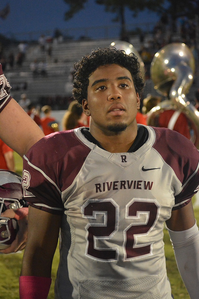 Sophomore running back Ali Boyce stands for the coin toss.