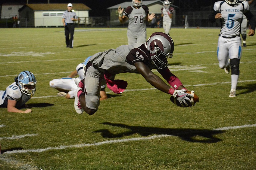 Senior wideout Stephon Turner dives across the goal line for a touchdown.