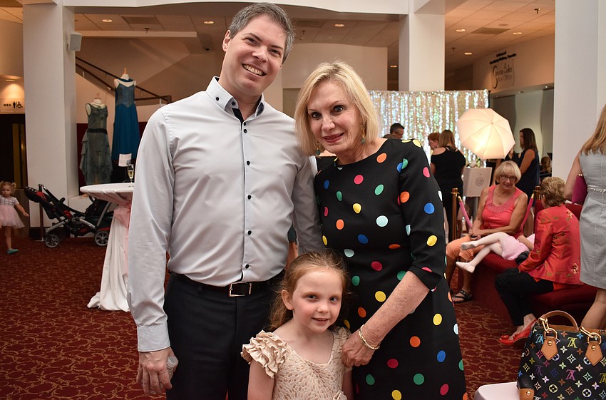 Sarasota Ballet Director of Education Christopher Hird, Izzy Wieand and Sarasota Ballet Board Chairwoman Hillary Steele