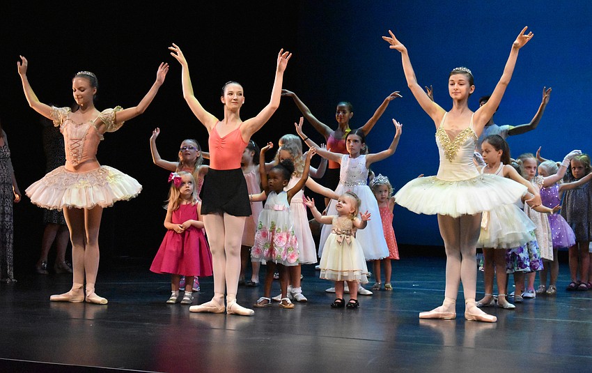 Guests tried their hand at some ballet exercises under the guidance of Sarasota Ballet School students at Tea and Tutus on Oct. 7 at the FSU Center for the Performing Arts.