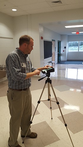 John LeJeune, of GHD, inspects for mold at Lakewood Ranch High School. Courtesy image.