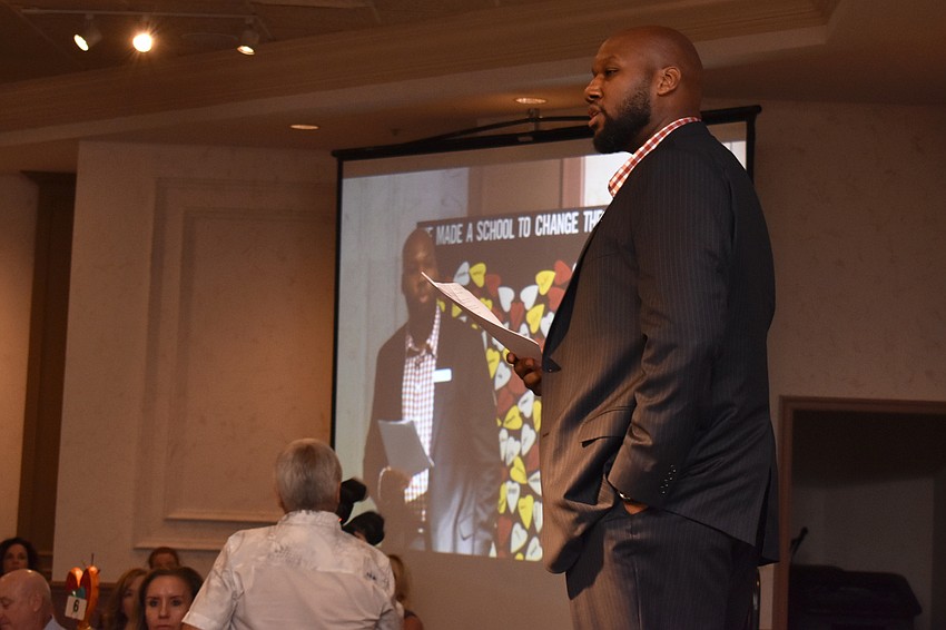 Cedric Homeed performs a piece of spoken word poetry at the Love Lunch on Oct. 11 at Michael’s On East.