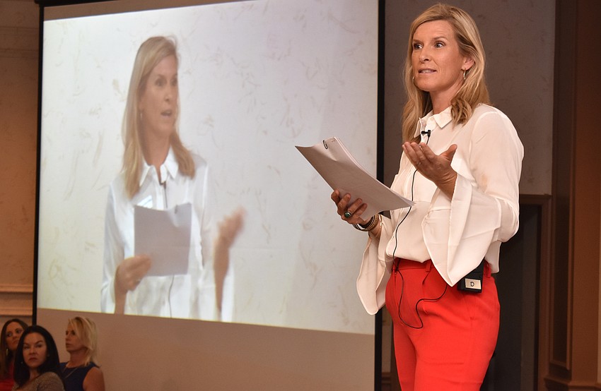 Co-Host Shannon Rohrer- Phillips educates the crowd about Visible Men Academy at the Love Lunch on Oct. 11 at Michael’s On East.