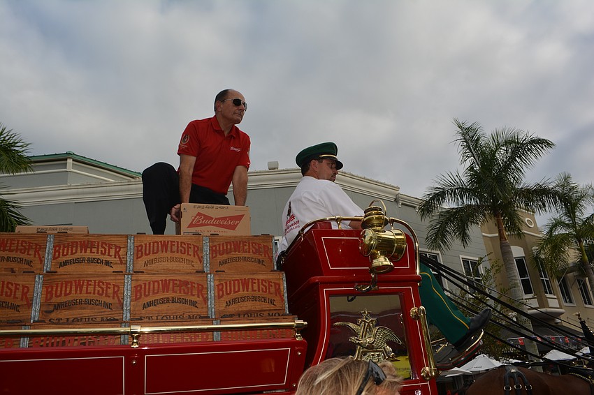 John Saputo, the owner and president of Gold Coast Eagle, did the deliveries along Lakewood Main Street personally.