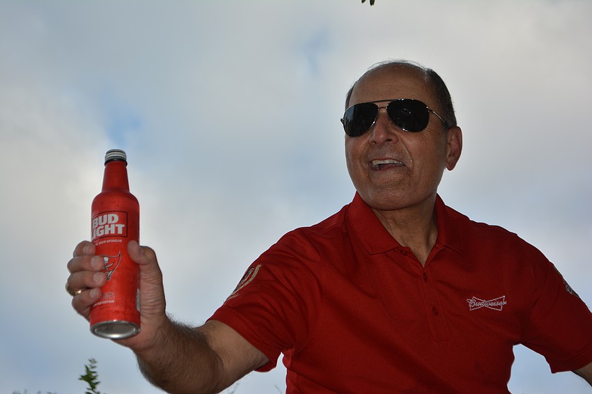 Gold Coast Eagle owner John Saputo must have figured if he was going to deliver Budweiser on Thursday, why not drink one?