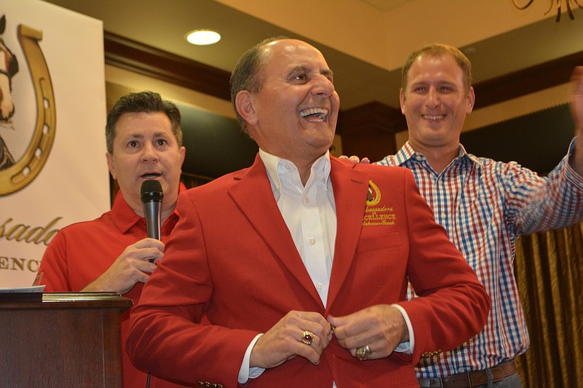 At a ceremony back at Gold Coast Eagle on Thursday, John Saputo is presented with the coveted Ambassadors of Excellence Red Jacket.